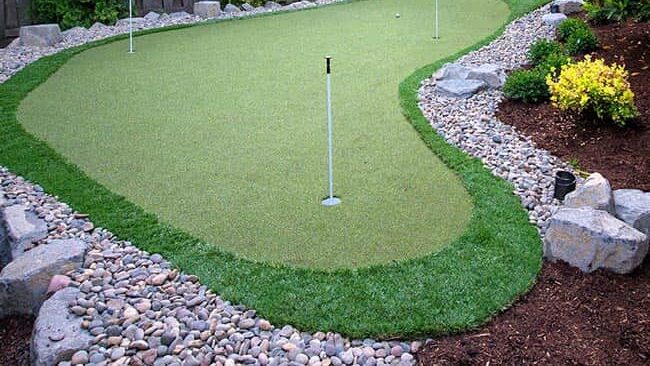 Putting green with landscaping