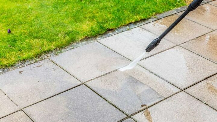 Cleaning pavers with pressure hose