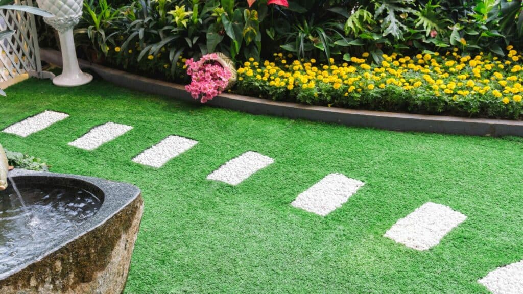 Artificial Turf and Stepping Stones in backyard
